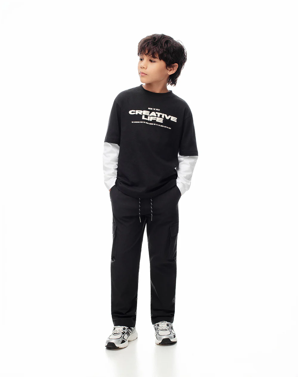 Pantalón tipo cargo negro niño